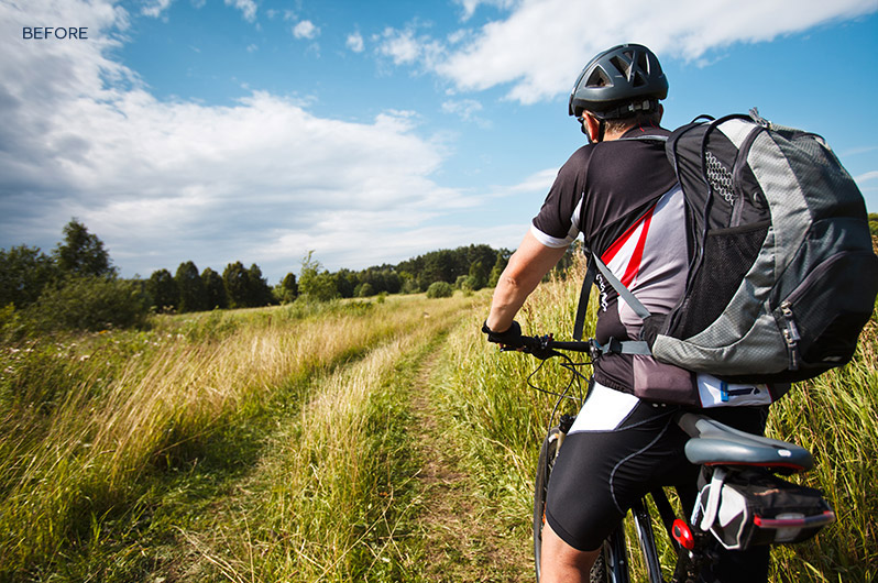Photoshop-Action-Bundle a cyclist in a grassland