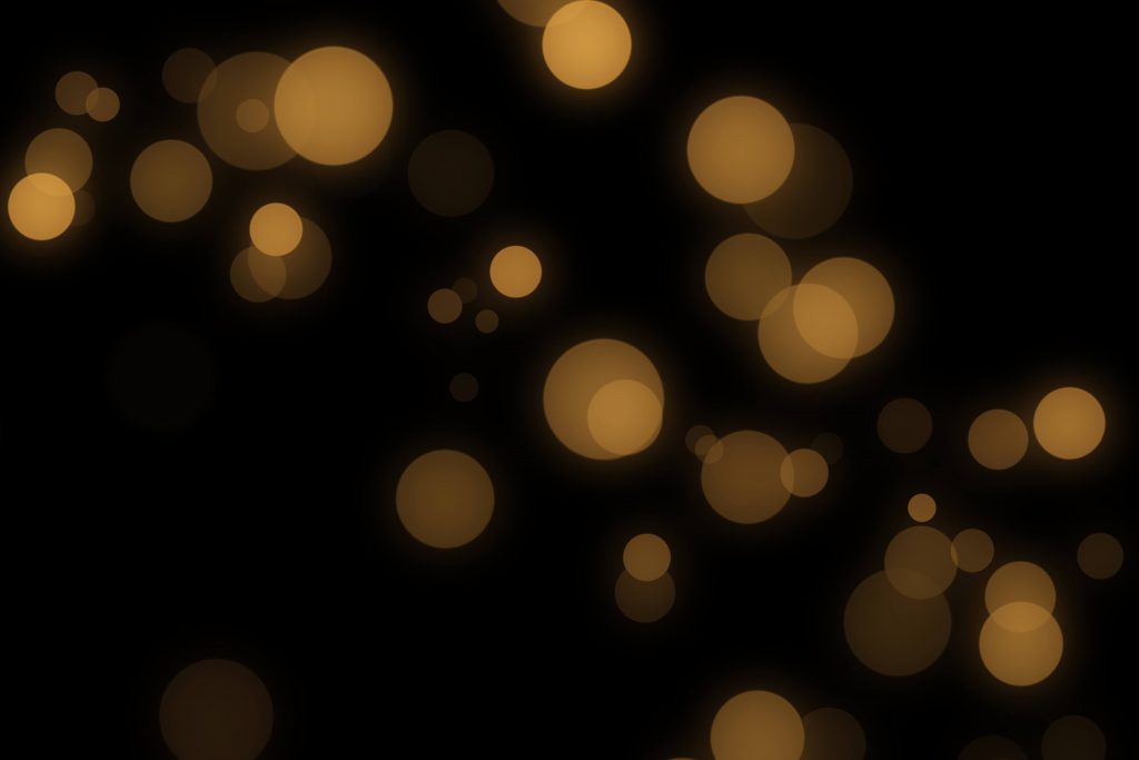 glimmering lights in dark background