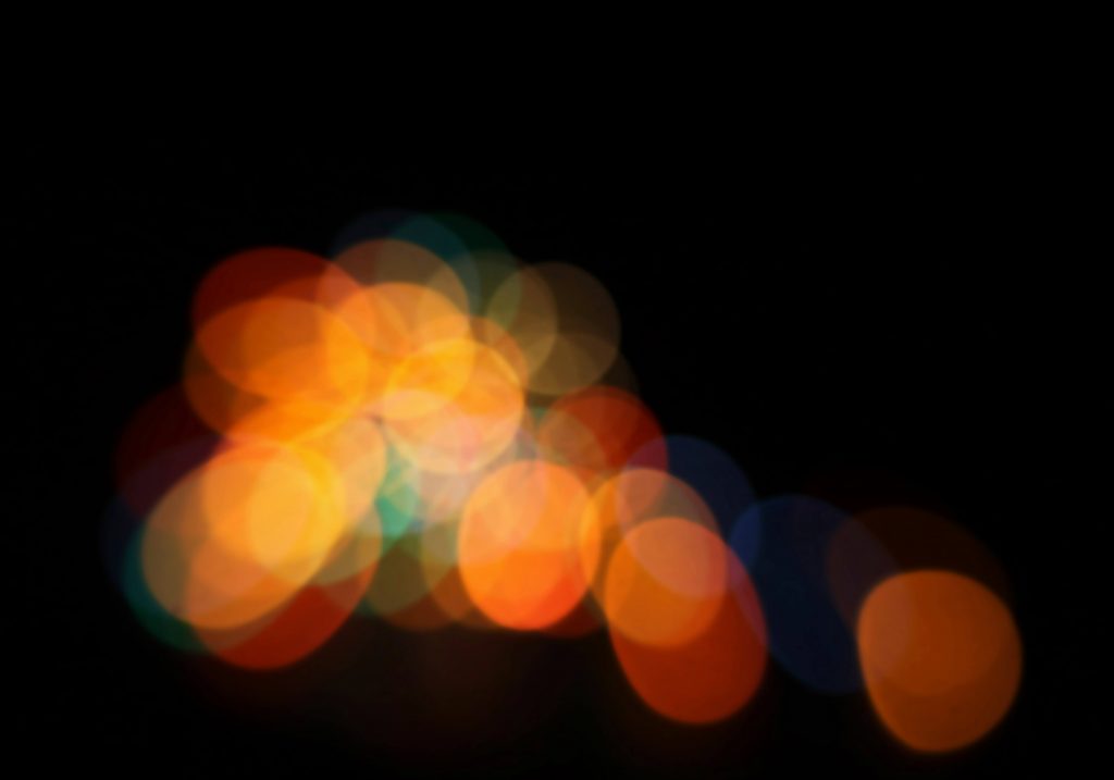 Luminous colorful lights in the dark background