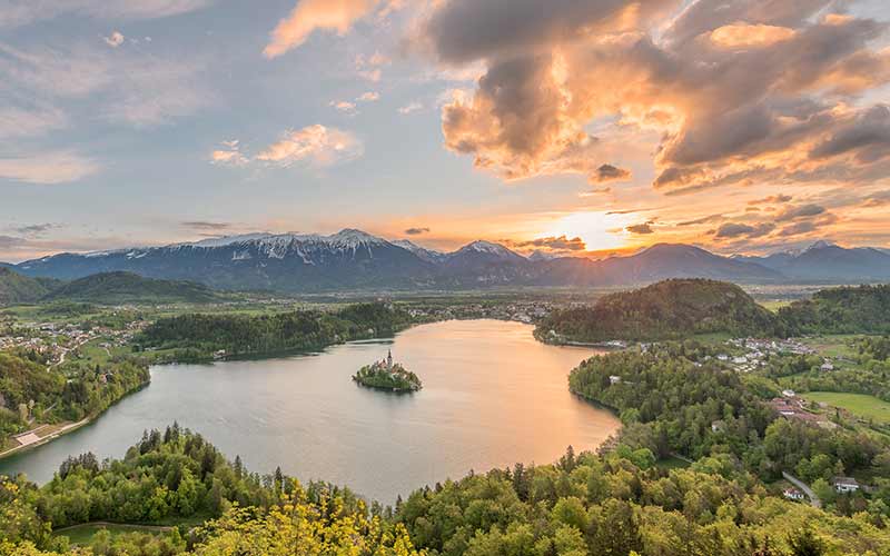 Beautiful spring background image with lake and mountain scenery