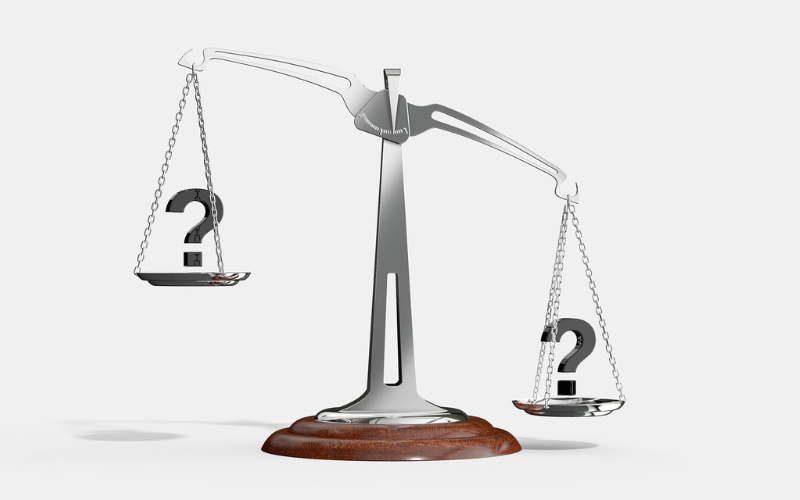 balancing scale - compare project managament software