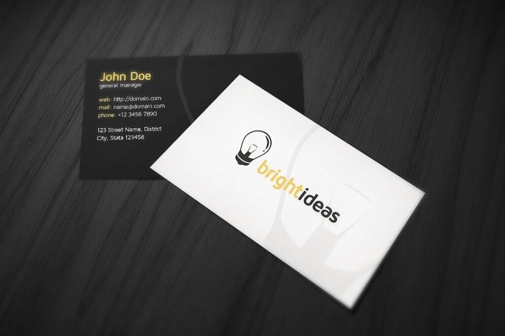 image of business card mockup with white front and black back