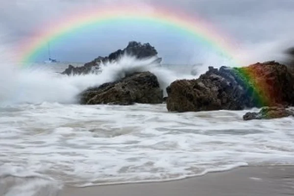 Studiomagic - Image Composite Editor after image of a sea shore with an added rainbow