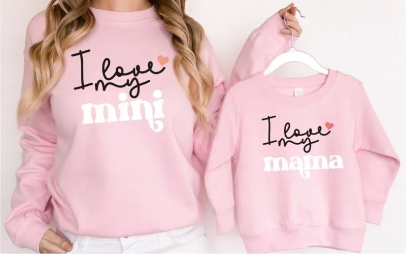 A preview of I love mom design printed on pink t-shirts