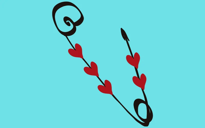 A preview of a safety pin with hearts