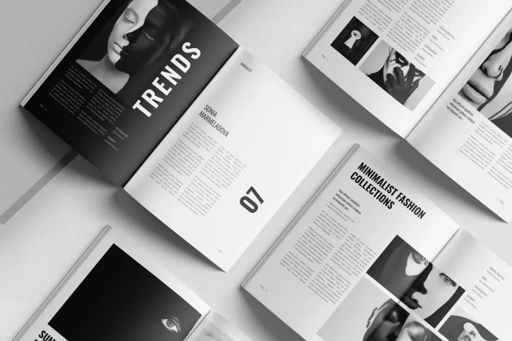 Open fashion spreads with grayscale portraits and style collections.