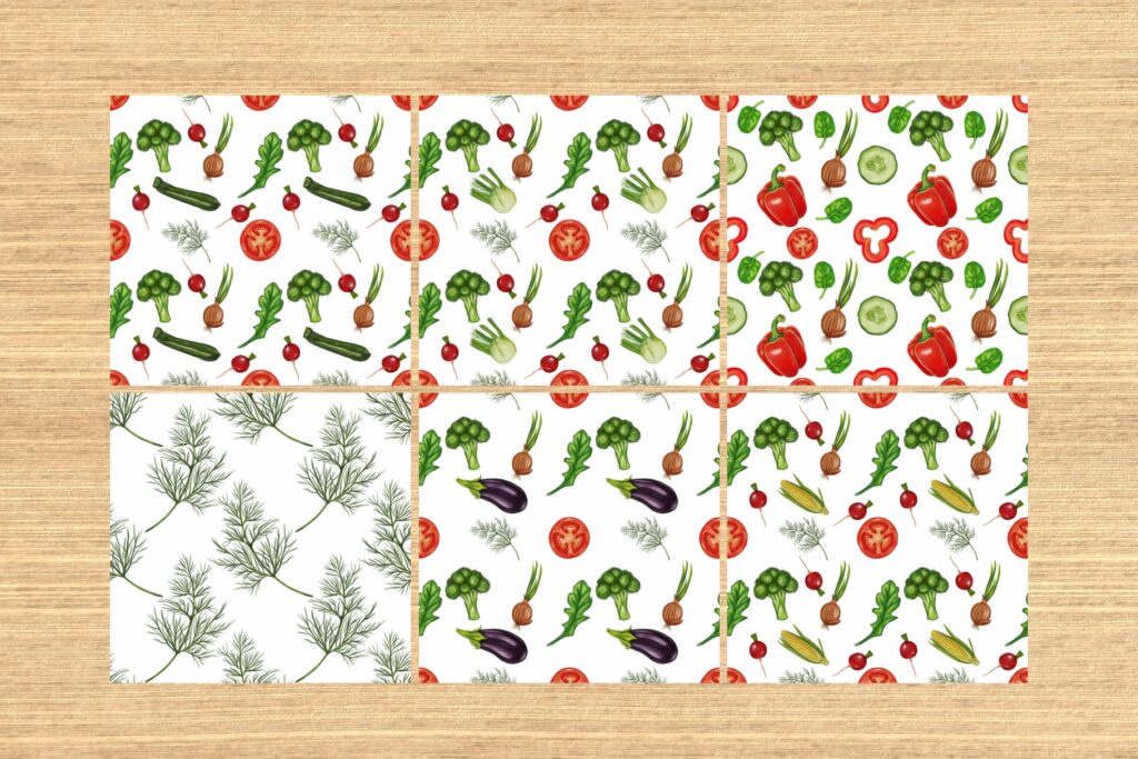 Six square tiles with colorful vegetable illustrations on white backgrounds, arranged on wood