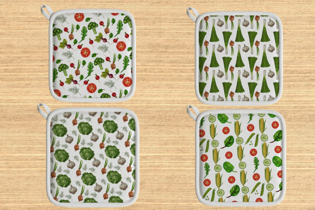 Four square pot holders with unique vegetable prints including broccoli, onions, and corn