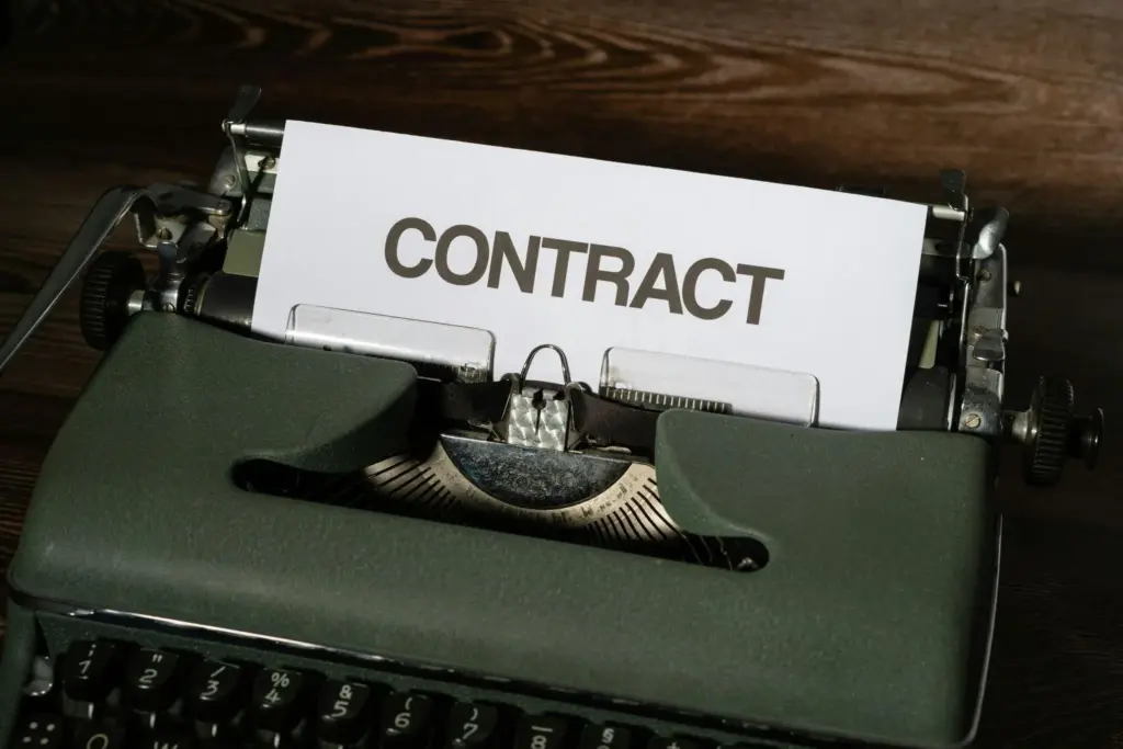 Contract written on a paper, CLM Software
